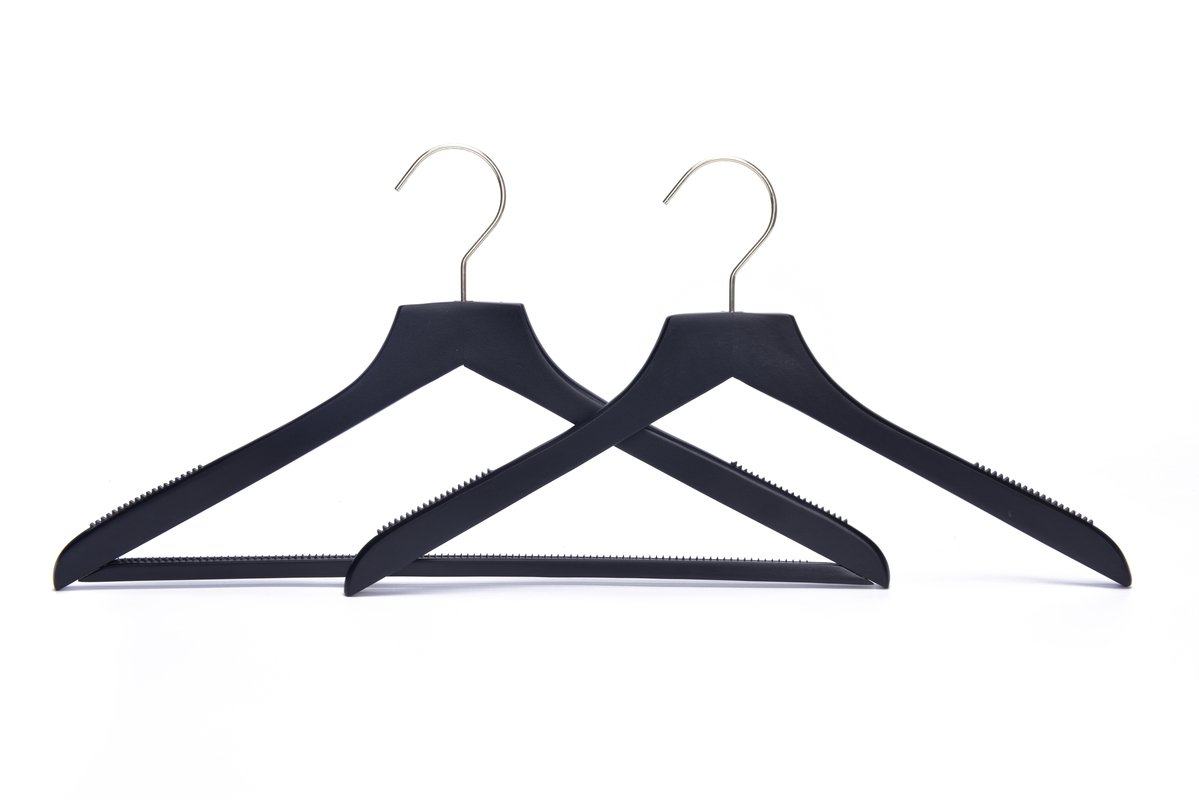 Black wooden shirt hanger for display